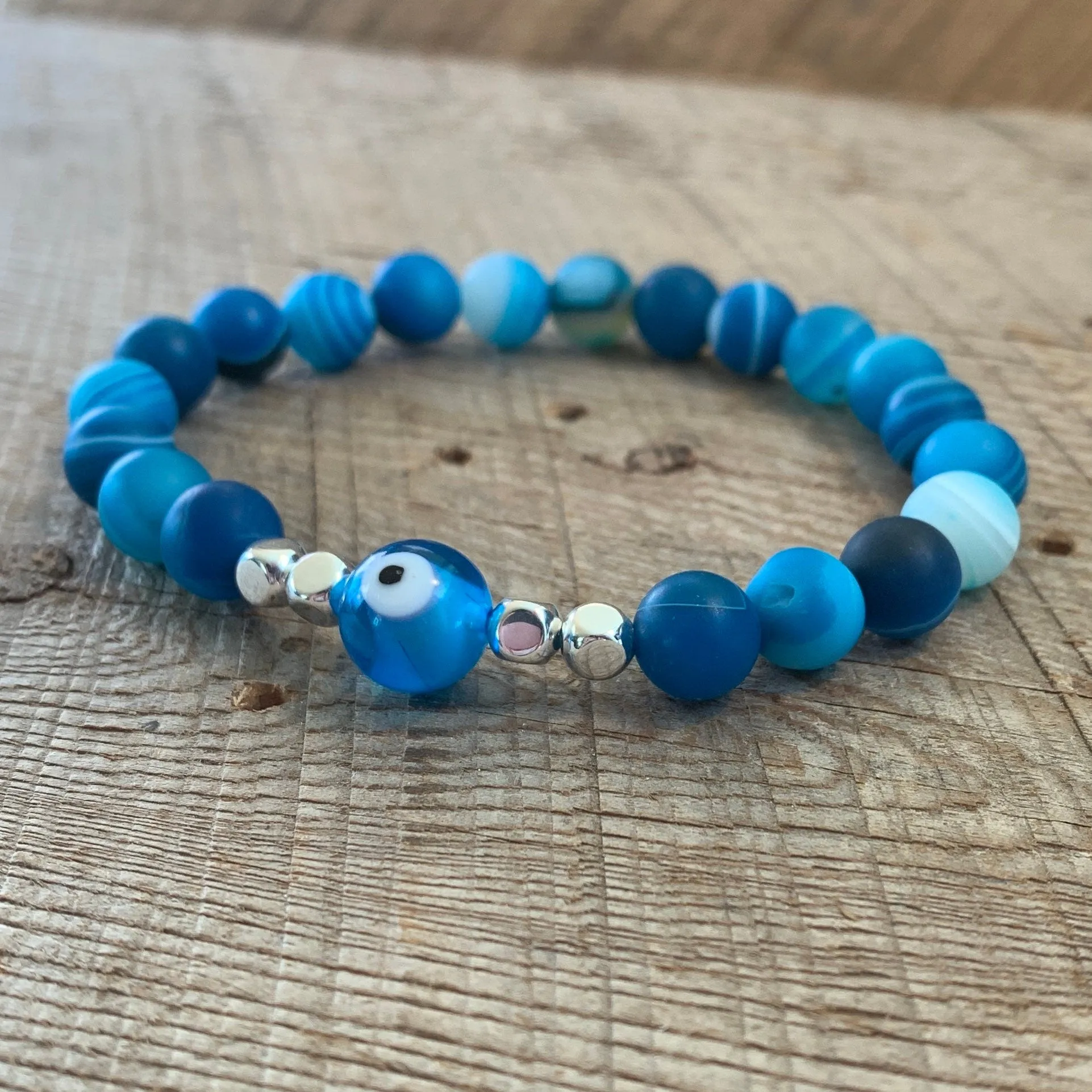 SariBlue® Ultra Blue Agate with Light Blue Evil Eye and Sterling Silver Beads Bracelet