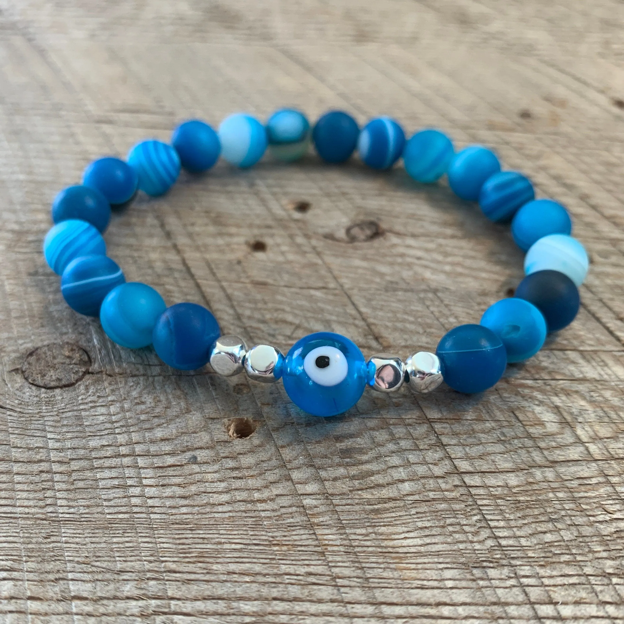 SariBlue® Ultra Blue Agate with Light Blue Evil Eye and Sterling Silver Beads Bracelet