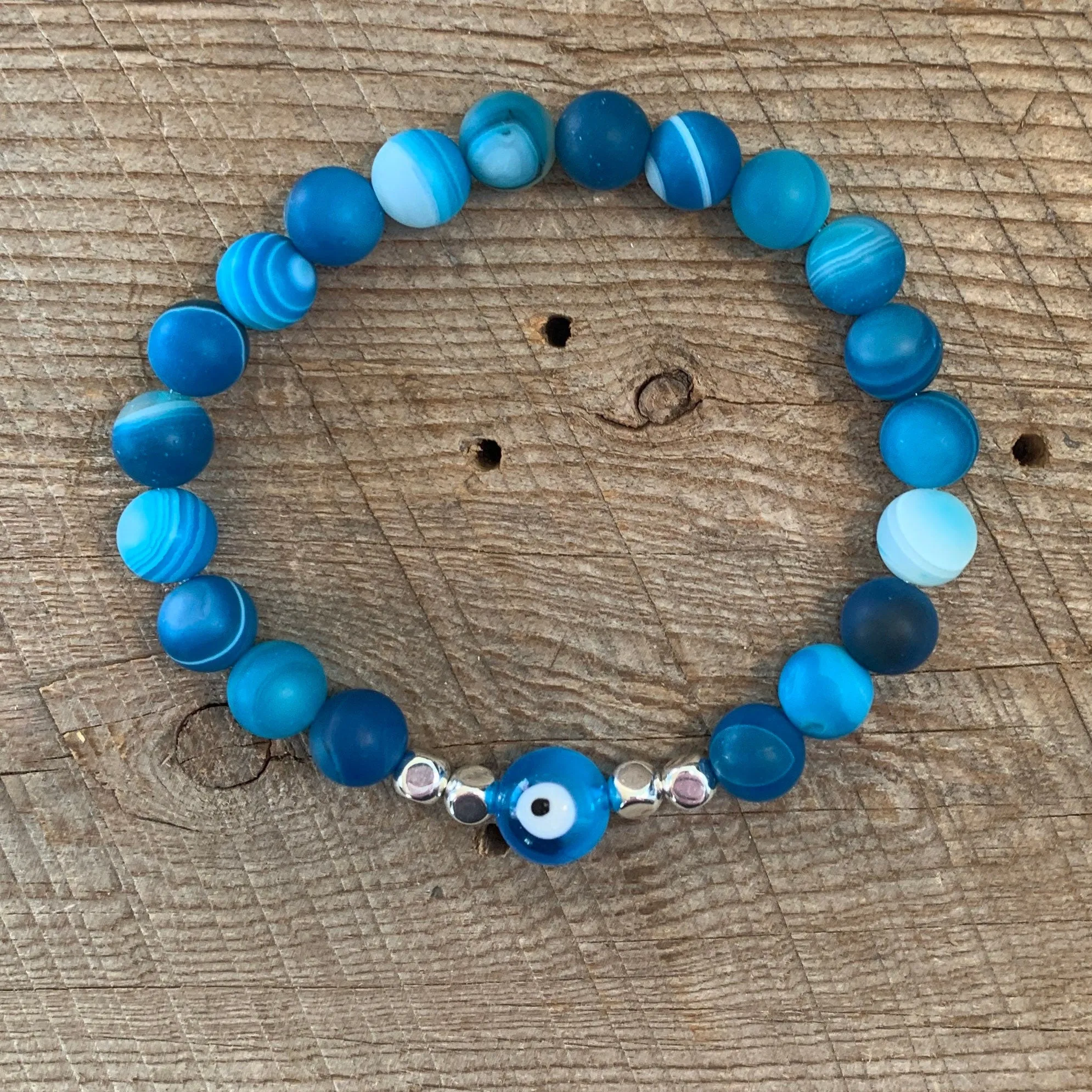 SariBlue® Ultra Blue Agate with Light Blue Evil Eye and Sterling Silver Beads Bracelet