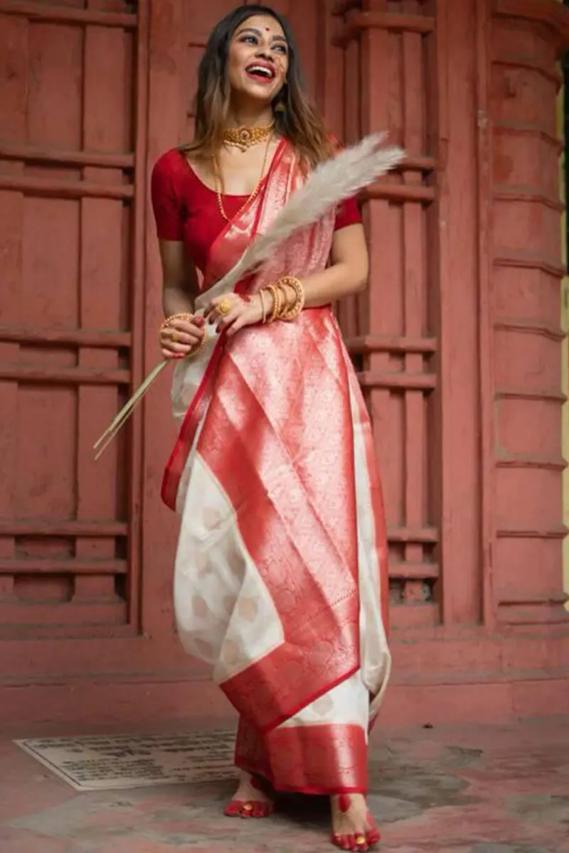 Staggering Off White Soft Silk Saree With Twirling Blouse Piece