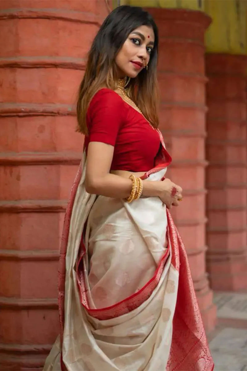 Staggering Off White Soft Silk Saree With Twirling Blouse Piece