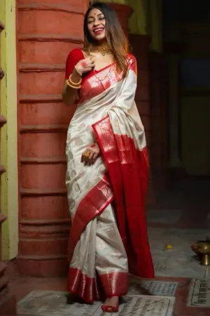 Staggering Off White Soft Silk Saree With Twirling Blouse Piece